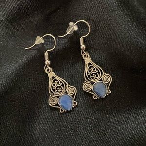 Blue Stone Set in a Silver Design Earrings